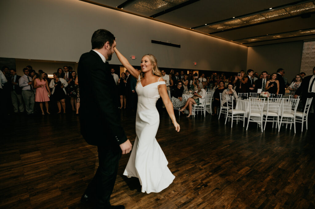 Wedding Reception Lighting illuminating the couple in Minneapolis