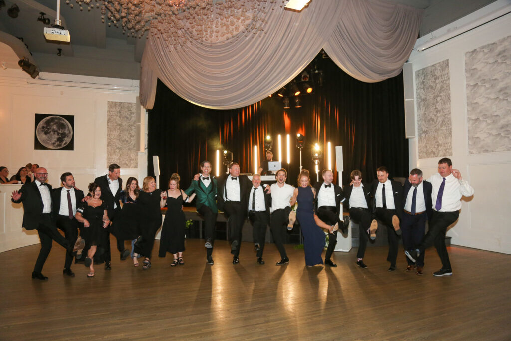 Just married couple and friends dancing the night away at The Metropolitan Ballroom. 