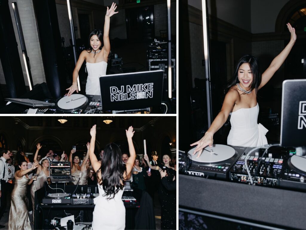 Bride guest-DJing behind the booth at her Minneapolis wedding reception