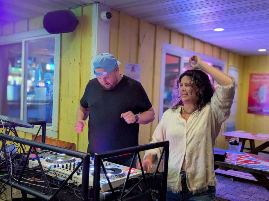 DJ Mike Nelson with the bride at Zorbaz in Alexandria, MN, the weekend of her lake cottage wedding